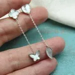 Длинные серьги асимметричные с сердечками, бабочками, клевером