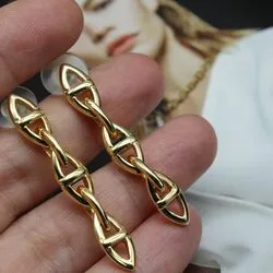 Серьги золотые цепи