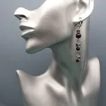 Стильные модели серег с гранатами