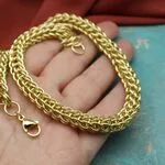 браслет с золотыми цепочками